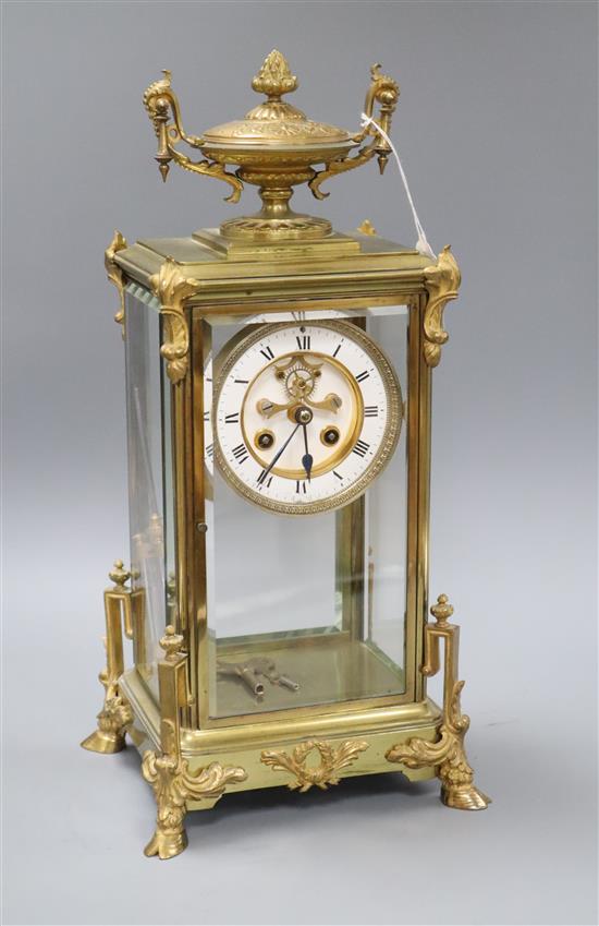 A French gilt brass four glass mantel clock, with mercury pendulum height 42cm